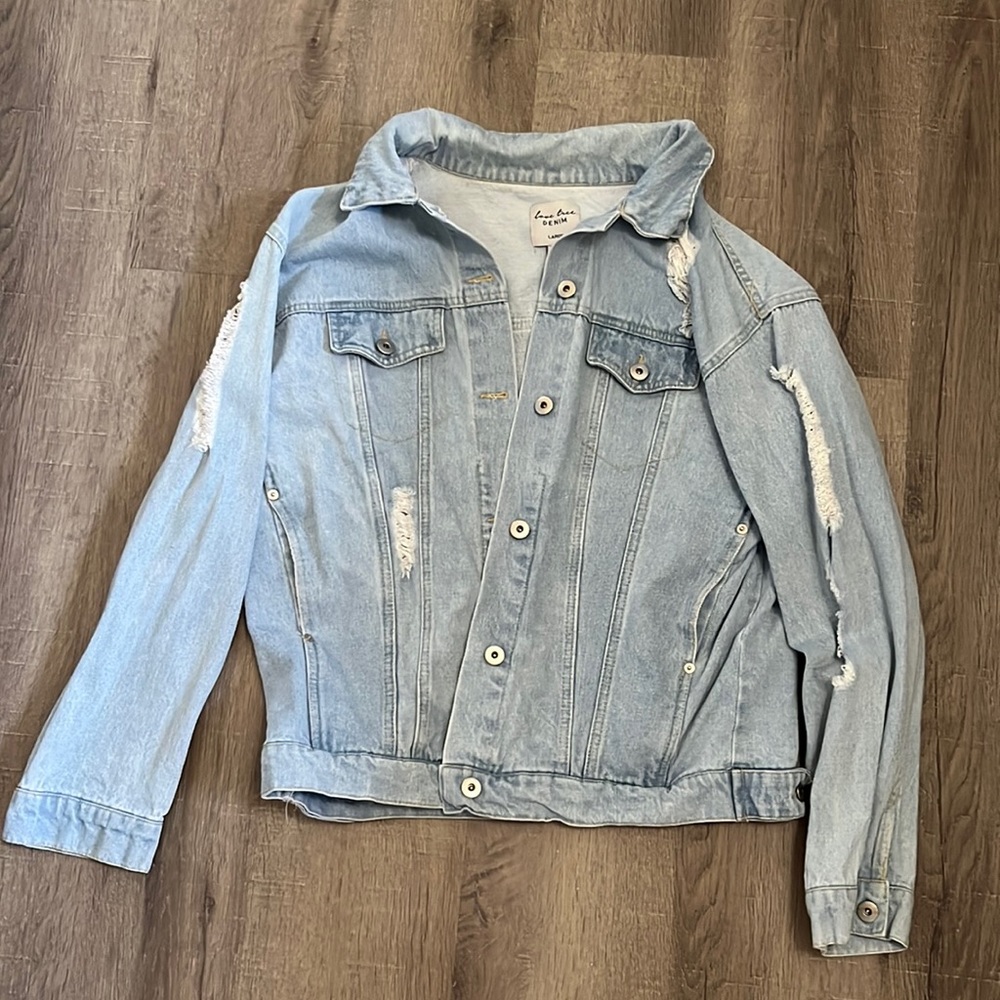 Distressed denim jacket